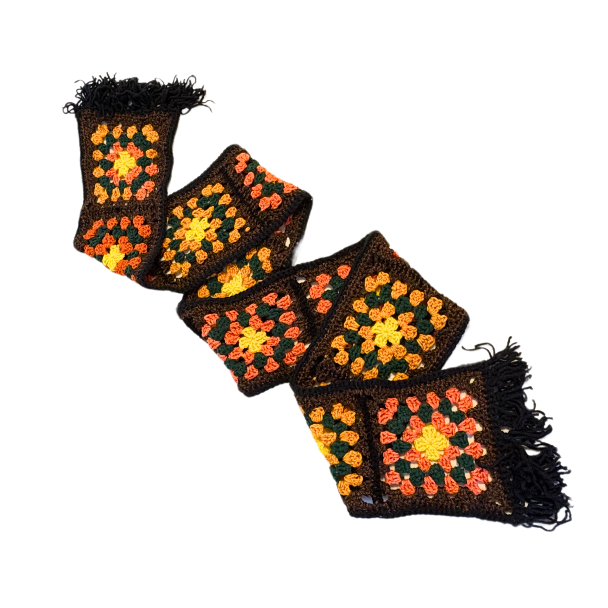 Colorful crocheted scarf with geometric pattern on a white background