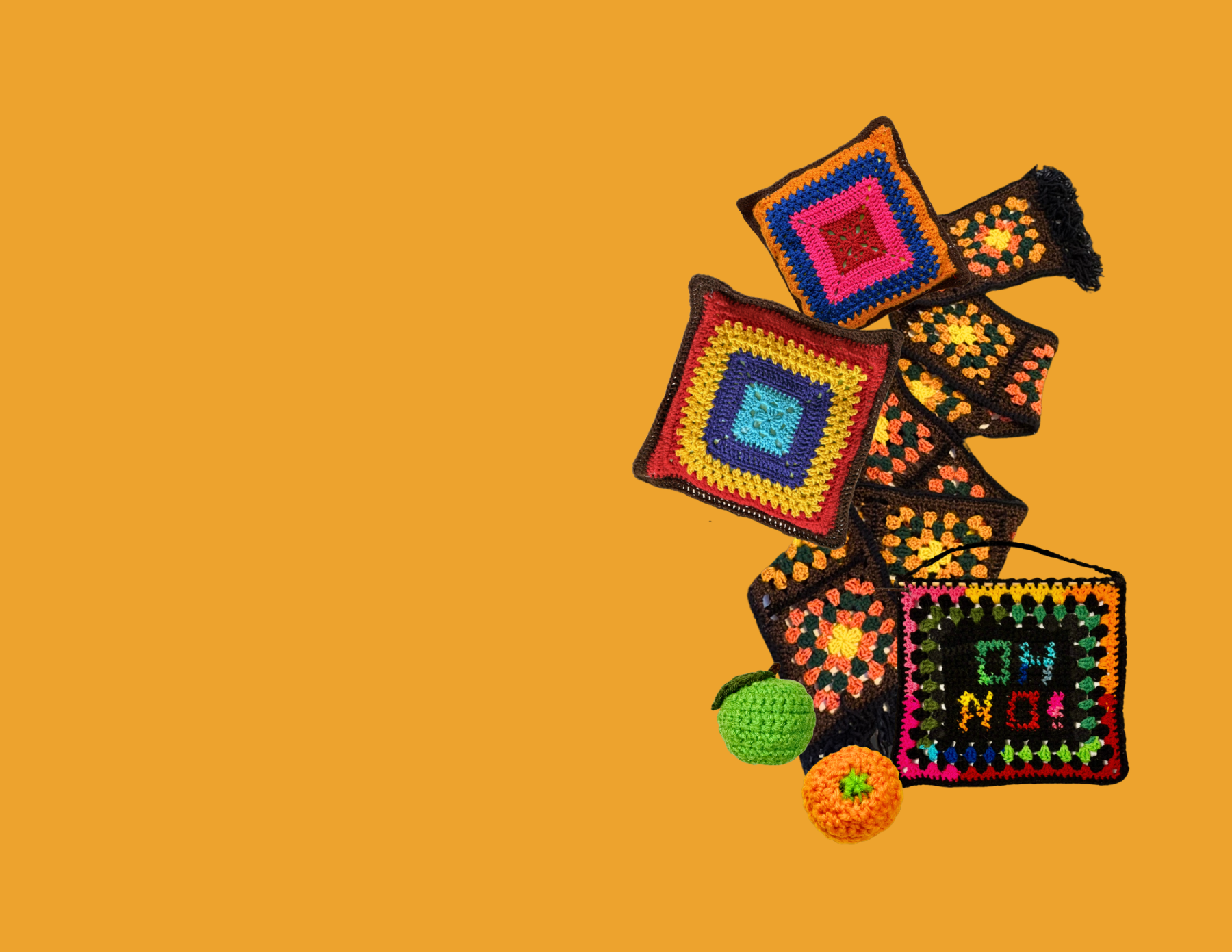 Colorful crocheted square patterns on a yellow background