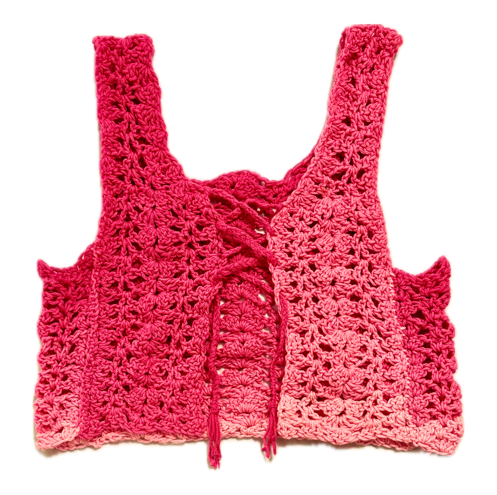 pink crochet top on a white background
