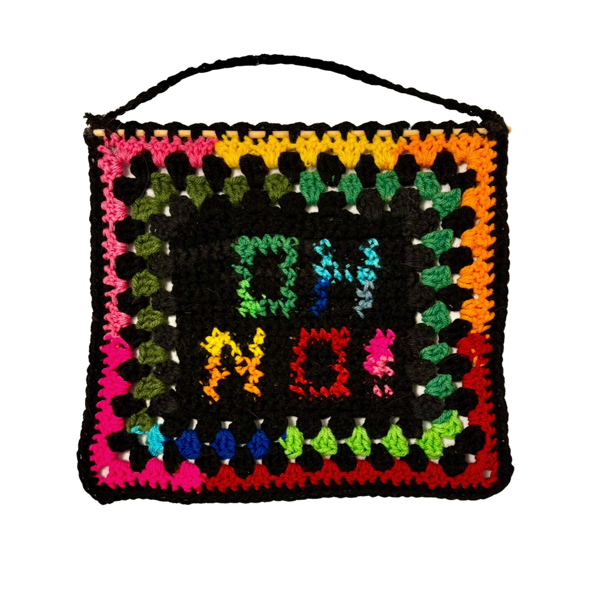 Colorful crocheted decor  with 'Oh No' text on a white background