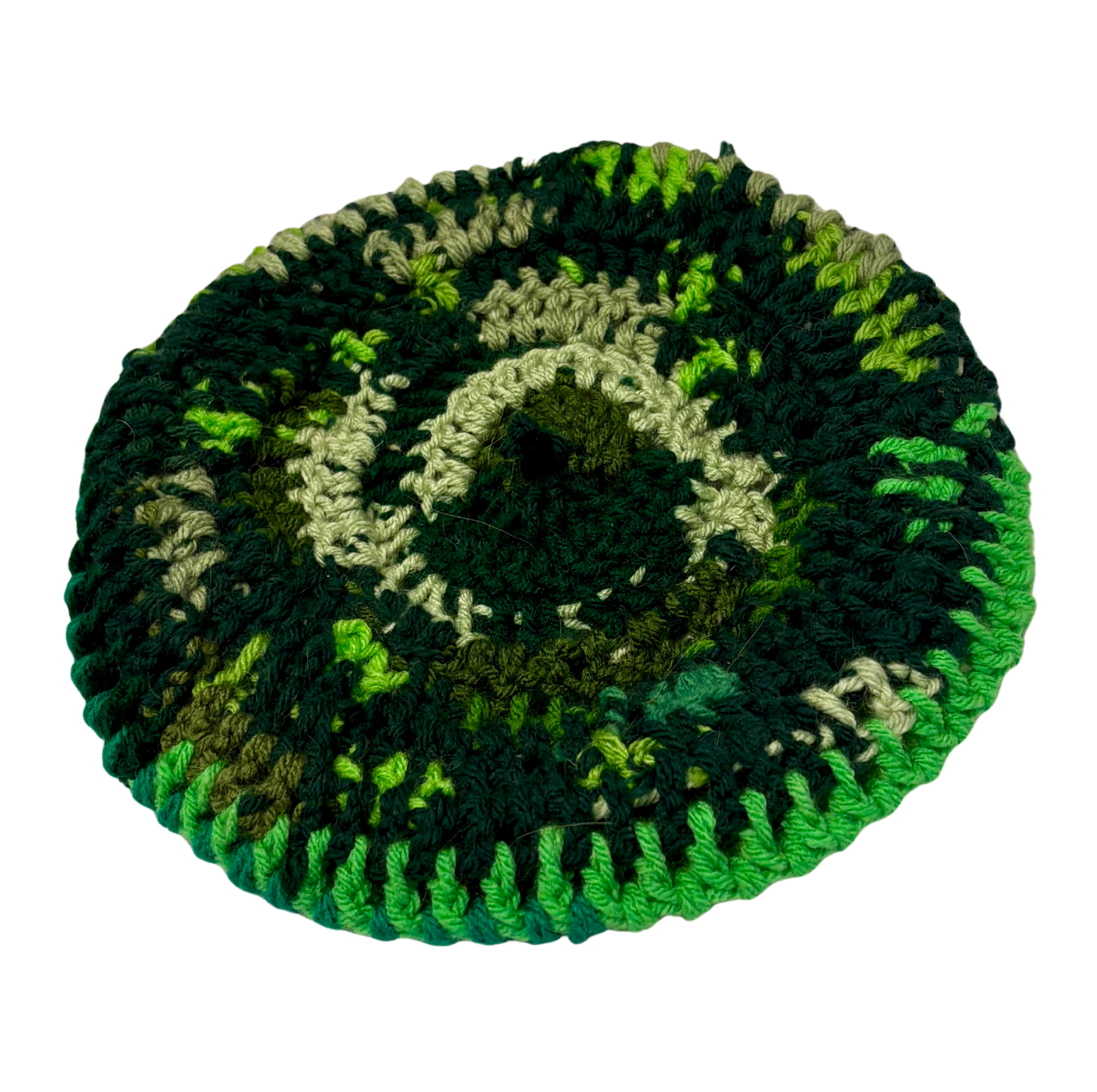 Green and black crocheted hat on a white background