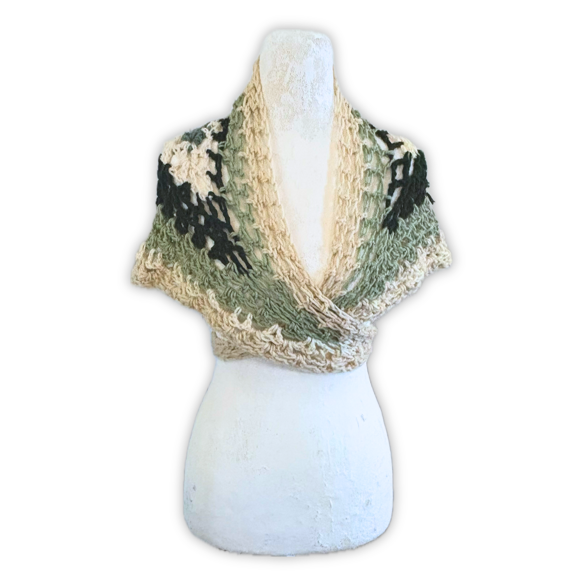 crochet scarf on a mannequin with a white background