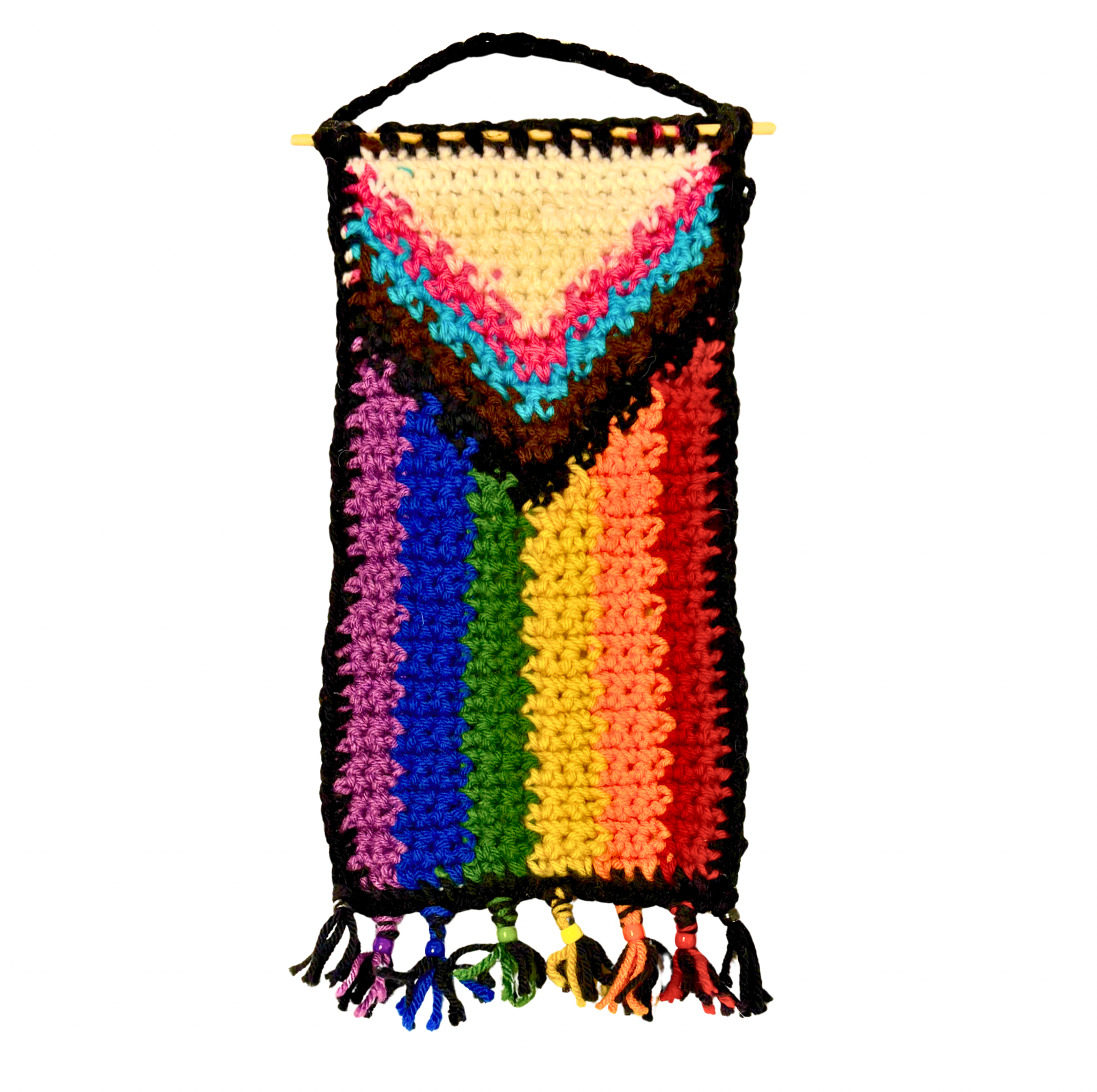 Colorful crocheted wall hanging with tassels on a white background
