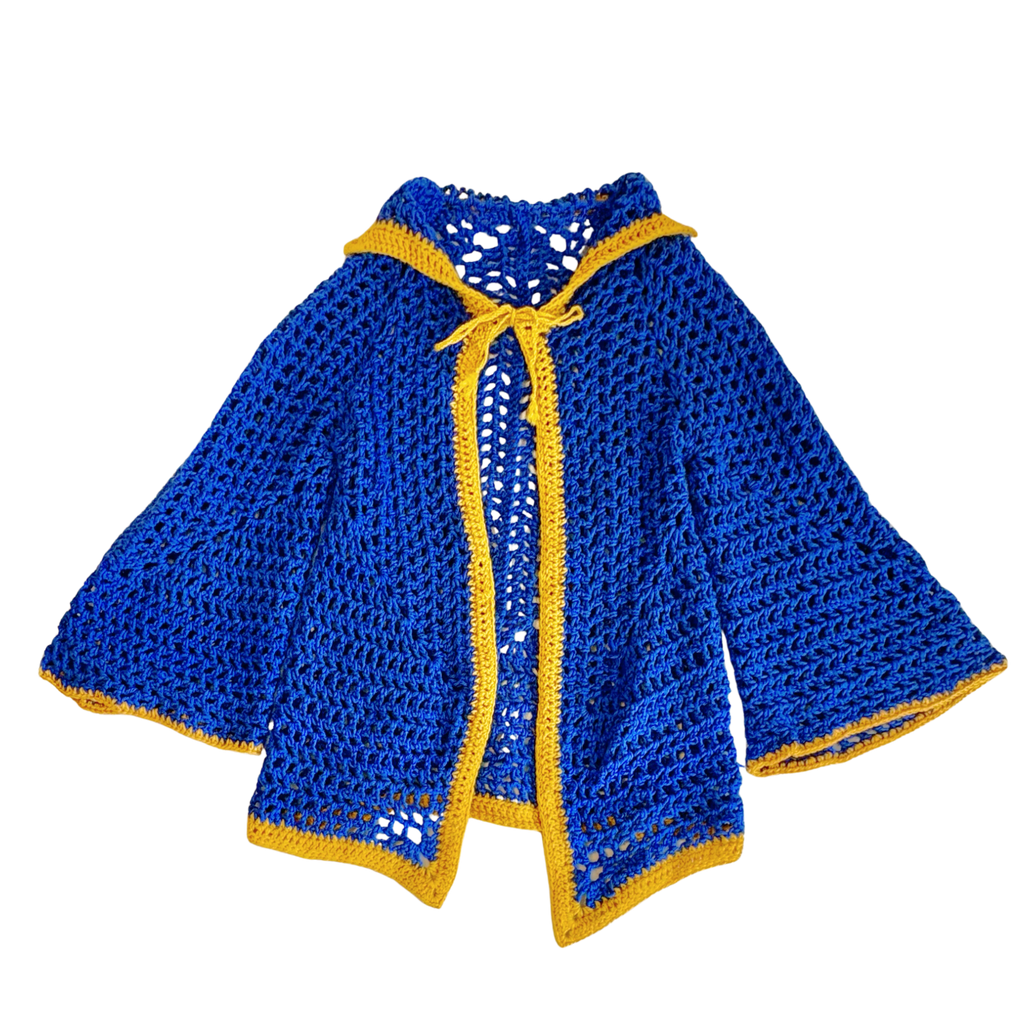 Blue and yellow crocheted cardigan on a white background